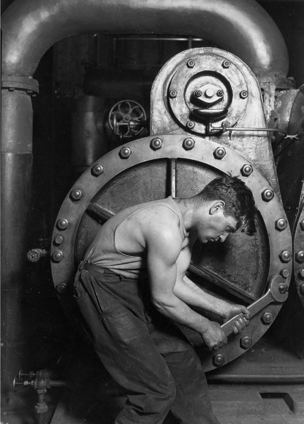"Power house mechanic working on steam pump" By Lewis Hine, 1920 National Archives and Records Administration
